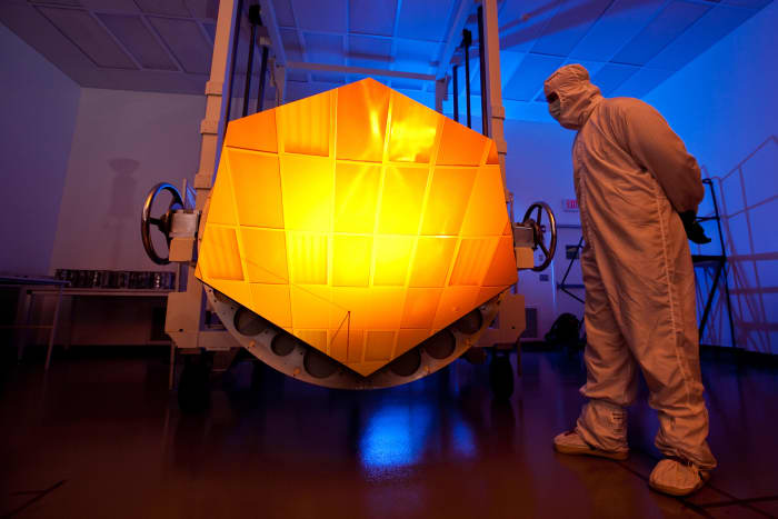 NASA's James Webb Space Telescope has a mirror that is coated with gold (element 79) covered with a thin layer of protective glass. The gold reflects red and infrared light.