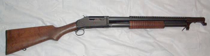 WWI: Model 97 Trench Gun. Note the barrel's heat shield and bayonet adapter at the front of the barrel