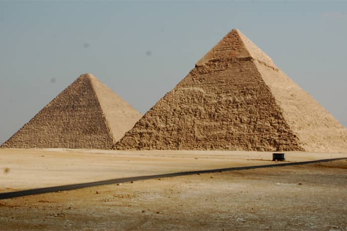 Could the construction of the pyramids, such as the above Pyramids of Khafre and Khufu at Giza, have been inspired by the Benben stone?