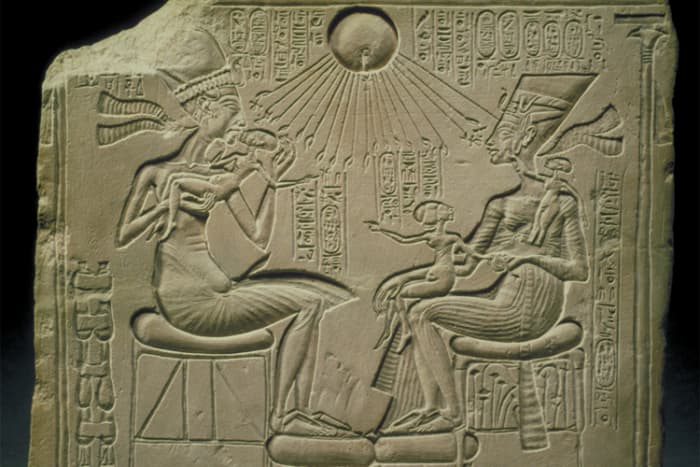 Pharaoh Akhenaten and the royal princesses being blessed by the Aten (sun disc), which Akhenaten and his followers claimed to be the one true god.