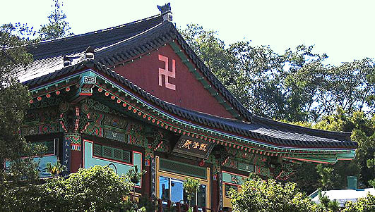 A left pointing swastika which can be seen on a temple in South Korea - this swastika symbol is revered by hundreds of millions of Buddhists throughout the world