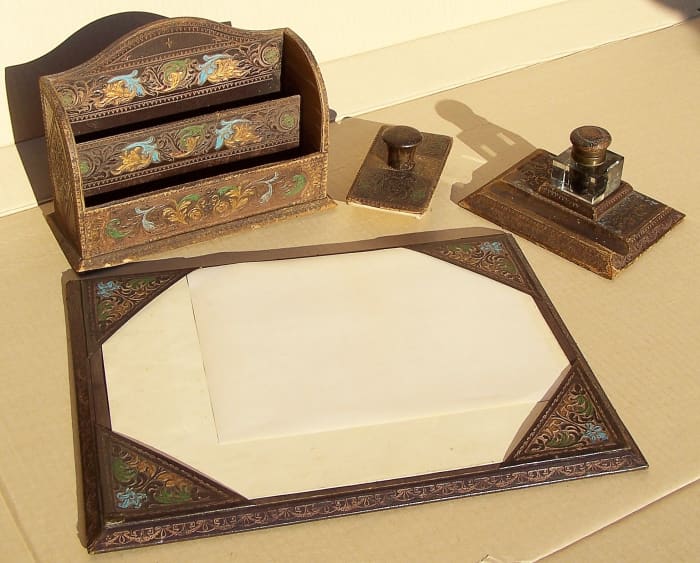 This blotting paper (the larger yellow sheet) dates from the early twentieth century. The Clock family used blotting paper as a carpet.