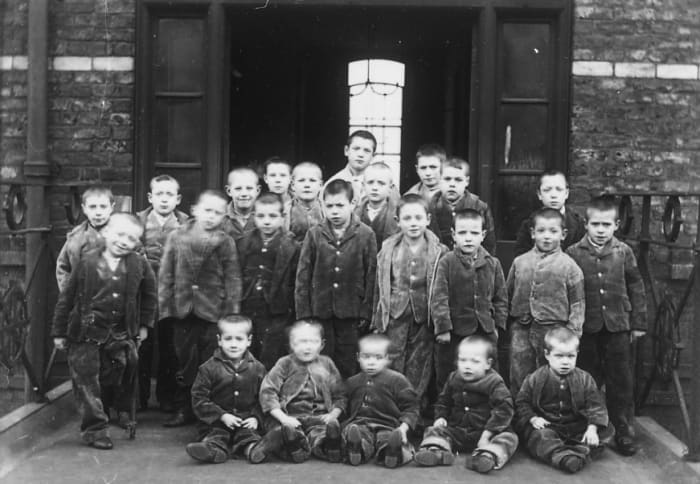 Group of pauper children at the workhouse would be trained in domestic service or a trade.
