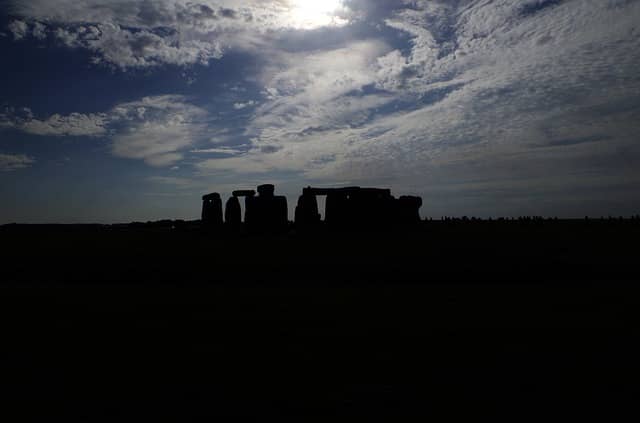 Stonehenge at night. Even the silhouette of the stone circle is iconic and instantly recognizable to many people. The monument is managed by English Heritage and a UNESCO World Heritage Site.