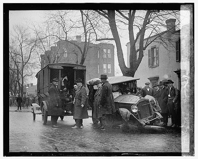 A bootlegger's wrecked car after a high speed chase with authorities. 22 January 1922