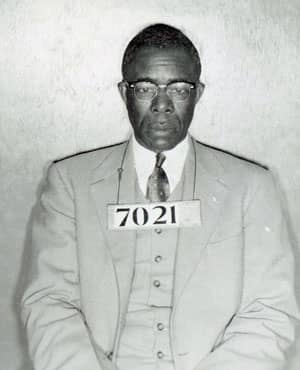 Photo of American civil rights leader and union organizer, Edgar Daniel Nixon, after he was arrested during the Montgomery bus boycott. Parks worked as his secretary through most of the 1940s and 50s.