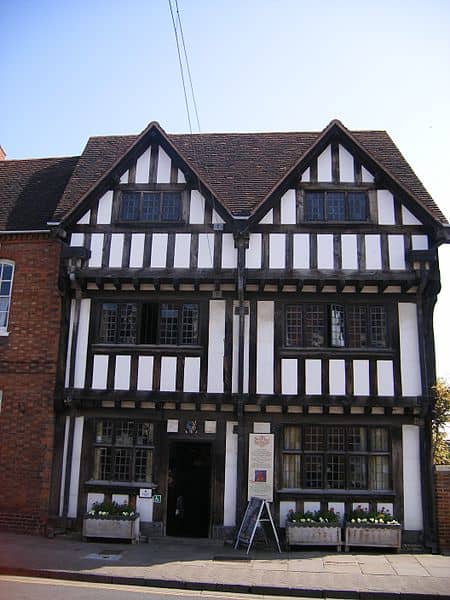 This is New Place, in Stratford-upon-Avon in the UK. It is the last house that William Shakespeare lived in. It shows the use of leaded windows, a technique developed in the mid-fifteenth century.