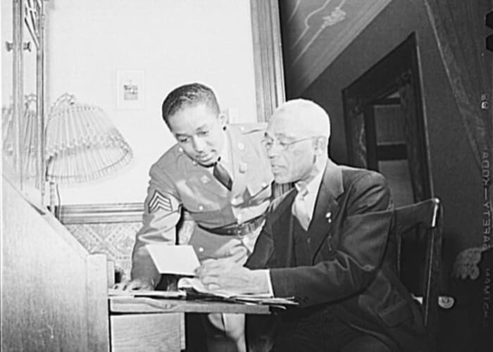 Sgt Franklin Williams discussing insurance problems with his father