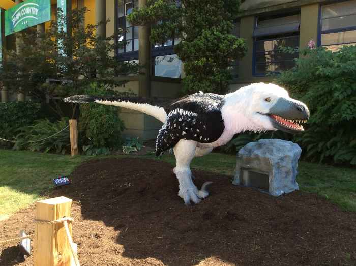 We don't know the colour of Dakotaraptor, but we do know that the feathers of Archaeopteryx were black and white.