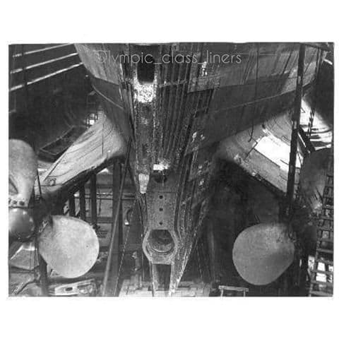 This photo shows, Olympic's stern post removed for replacement. The task required the removal of the ship's rudder and center propellor.
