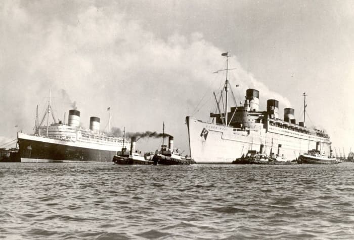RMS Queen Elizabeth converted back to civilian service alongside RMS Queen Mary still as a troopship.