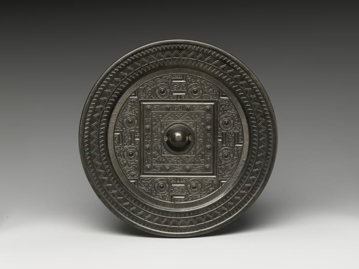 Mirror with Game Board Design, Han dynasty (206 BC - 220 AD), China. Held by the Metropolitan Museum of Art, 17.118.42, and currently on view in Gallery 207