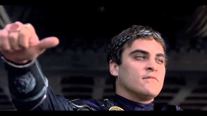 While he is deciding whether to point his thumb up or down, historians are deciding if an emperor would even use his thumb.