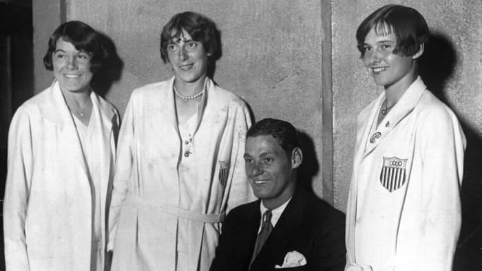 1928 U.S. Olympians, L-R: Katharine Maguire of St. Louis, Dolores Boeck of St. Louis, Johnny Weissmuller, champion swimmer from Chicago, and Betty Robinson, sprinter champion from Chicago (Associated Press)