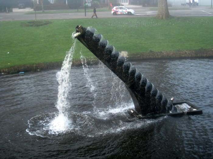 Archimedes screw as a piece of sculpture in the Netherlands demonstrating its function - photo by Polleket