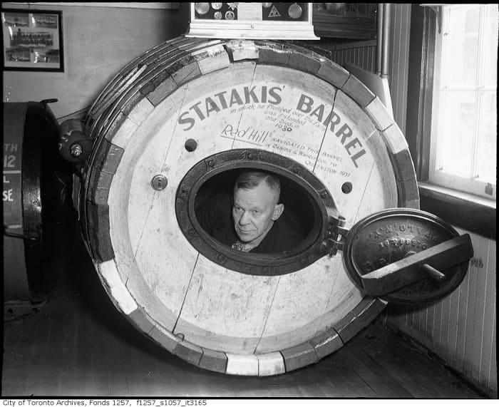 "Red" Hill was a famed Niagara waterman and adviser to several barrel jumpers. Here he peeks out from George Statakis barrel, which he recovered from the river.