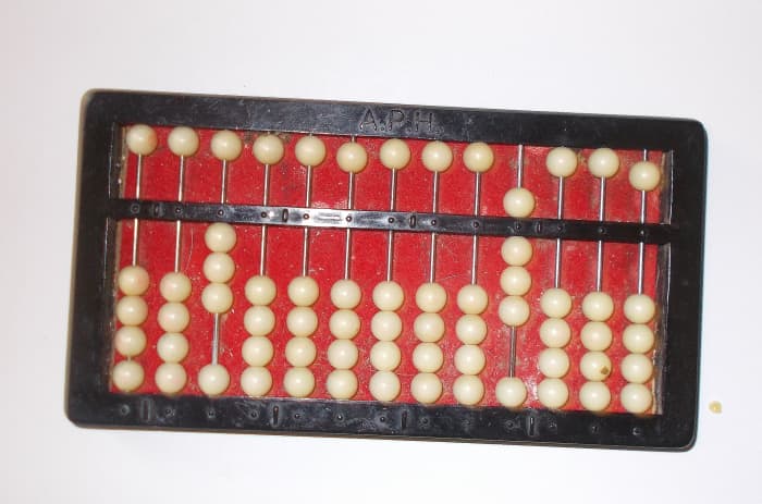 This is the fraction which is the answer for the equation ½ x ¾. The abacus is showing 3/8.