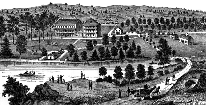 The Cold Spring Resort in its heyday. What was then a cleared-out mountain side with a lake now looks much different as the buildings and lake are gone, and the slopes and valley are once again covered with thick forest.