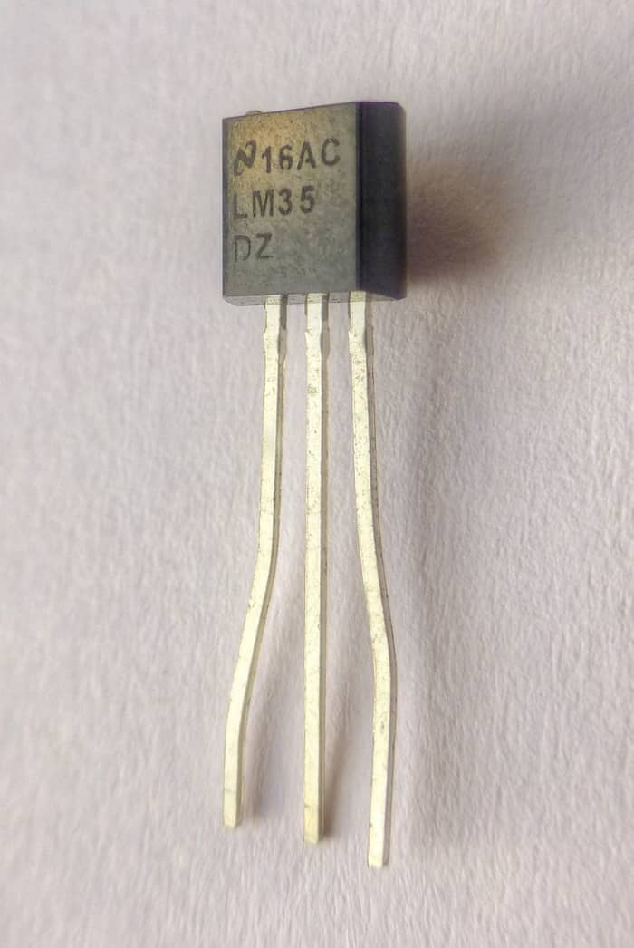 Integrated circuit (IC) temperature sensor. This is an electronic component that can measure temperature and produce an electrical signal proportional to it.