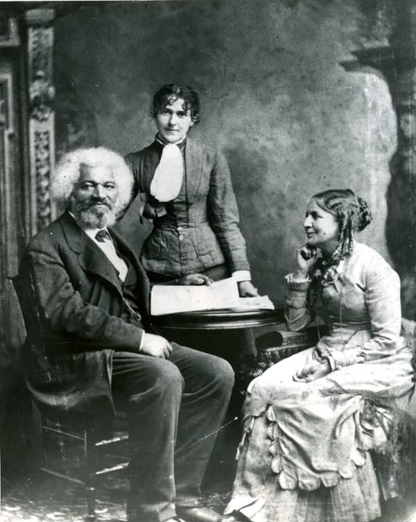Helen Pitts Douglass (1838 – 1903), seated, with her husband Frederick Douglass. The standing woman is her sister, Eva Pitts.