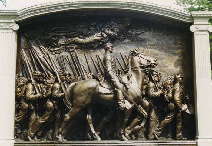 The Memorial to Robert Gould Shaw and the Massachusetts Fifty-Fourth Regiment is a bronze relief sculpture by Augustus Saint-Gaudens in the Boston Common.