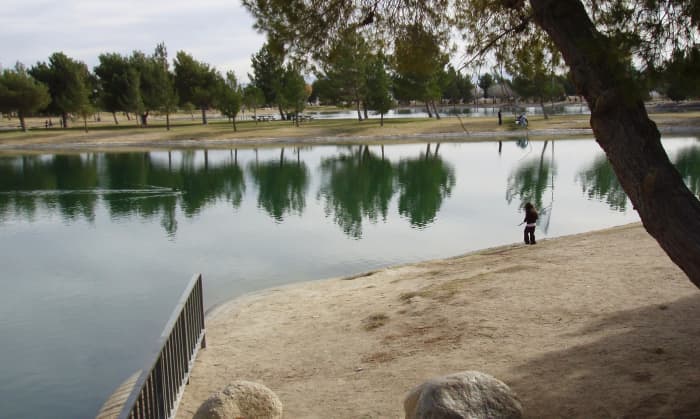 Sandy bottoms and shade are both crucial to having open spaces that can absorb rain into the aquifer. A photo like this can show how open space can be made attractive and reflect the natural environment