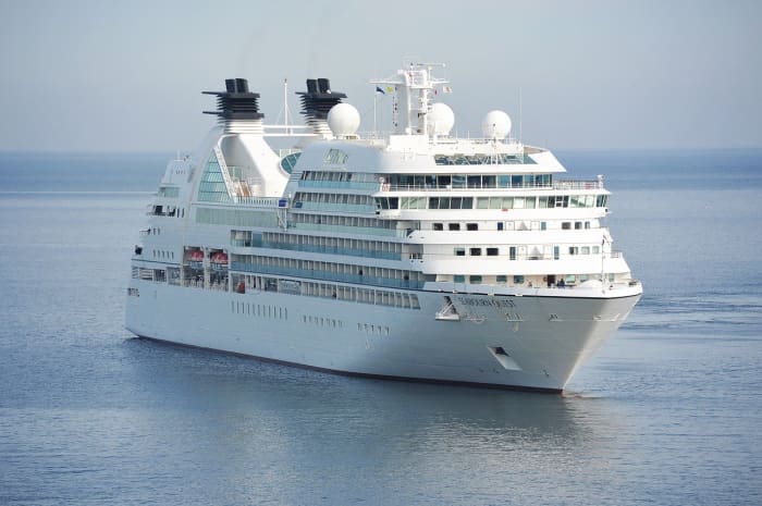 Ships float because they displace a huge amount of water and the buoyant force can support the weight of the ship.