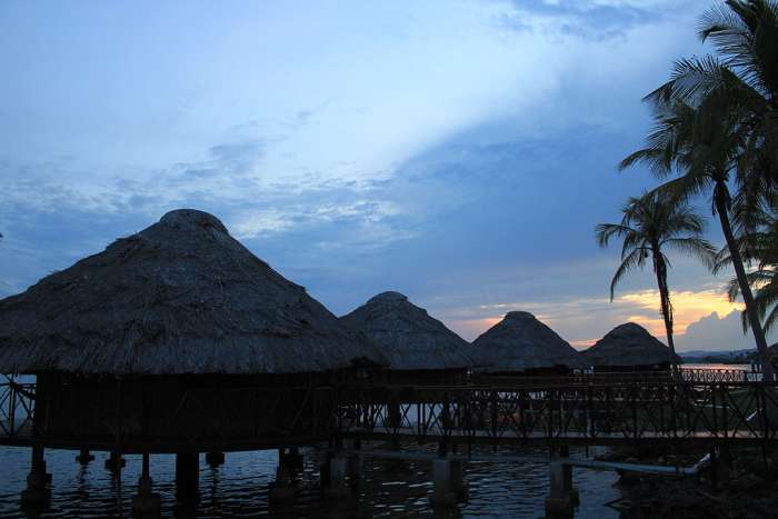 Contemporary traditional Cuna houses in the Guna Yala built on stilts over shallow coastal marshes