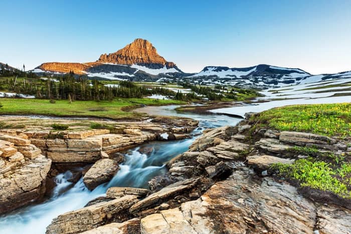 Glacier National Park: is an area of spectacular mountain ranges, alpine meadows, thick forests, tall waterfalls, countless sparkling lakes, and numerous glaciers. www.nps.gov/glac/index.htm