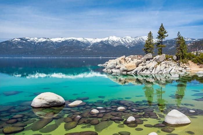 Sand Harbor Beach, Lake Tahoe: the sparkling blue water of Lake Tahoe, surrounded by often snow-capped mountains, is one of the most beautiful sites in Nevada.