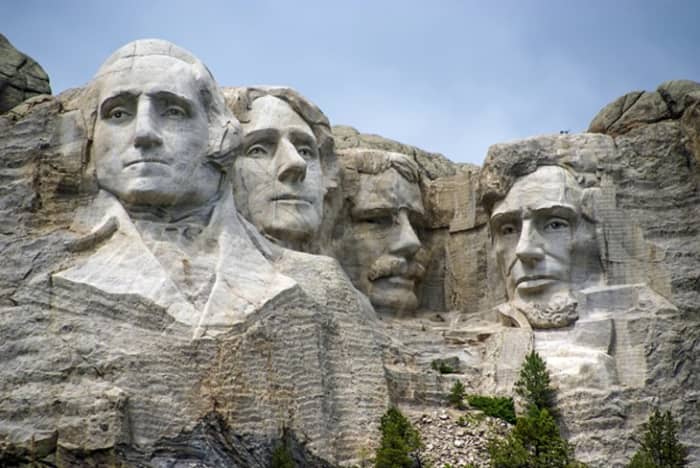 Mount Rushmore National Monument: carved majestically into the side of the mountain are the heads of Presidents George Washington, Thomas Jefferson, Abraham Lincoln, and Theodore Roosevelt. https://www.nps.gov/moru/planyourvisit/index.htm