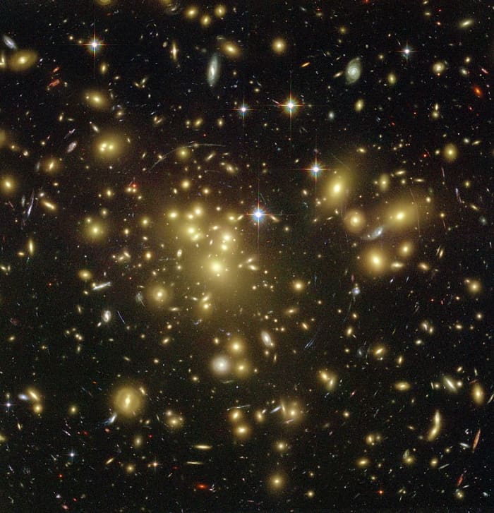 Pictured above is an image from the Hubble Space Telescope of a galaxy cluster known as Abell 1689. The distortion of light is believed to be caused by dark matter through a process known as gravitational lensing.