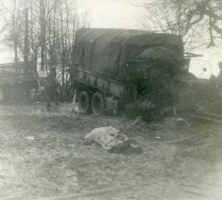 No matter what your job, it was dangerous - Artillery battalion mess sergeant lies dead after a German barrage, April 1945.