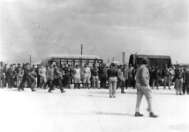 The 101 arrested officers about to board transports to take them to Godman Field for court martial. Photo taken with a hidden camera to avoid confiscation.