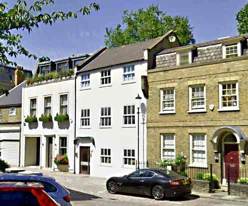 The affluent, leafy avenue of desirable Georgian houses in Kensington - before the red candy stripes came to town