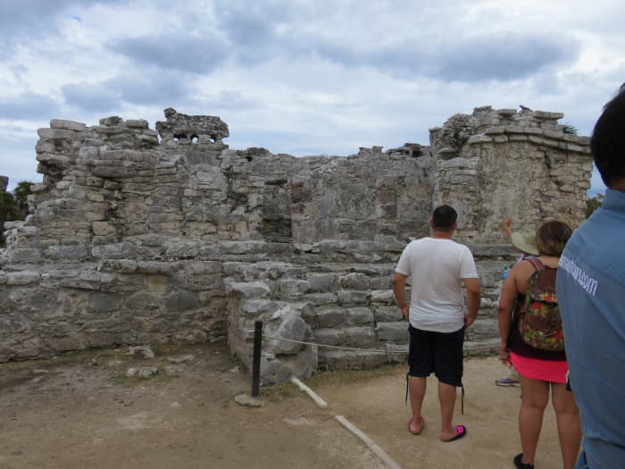 This is the home of one of the priests. As you climb the stairs, you enter the first room. The partial wall divides the house front and back into two rooms and indicates where the grave was located. The private altar is along the home's back wall.