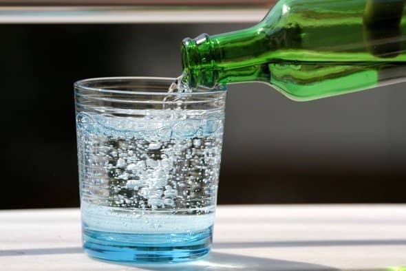 The pouring of bottled water in a glass is a perfect analogy of the relationship between specific power and specific energy.