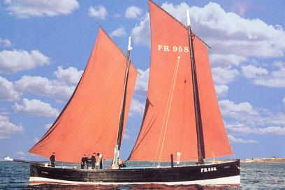 A small boat that completed a big adventure. (Boat above is a restored Scottish Lugger, not the The Mystery)