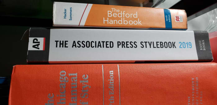 The Bedford Handbook I referenced, The Associated Press Stylebook, and The Chicago Manual of Style.
