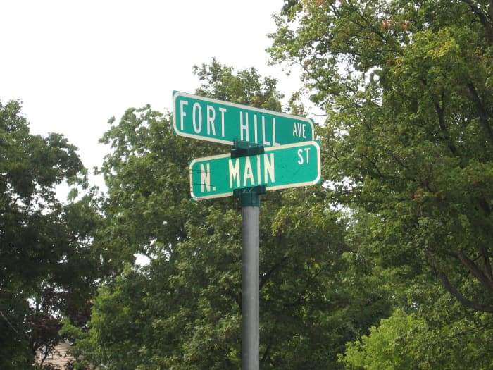 Corner of Ft. Hill and Main St. in Canandaigua, New York where a stately home still has a candle burning in memory of the son who went off to fight in World War I