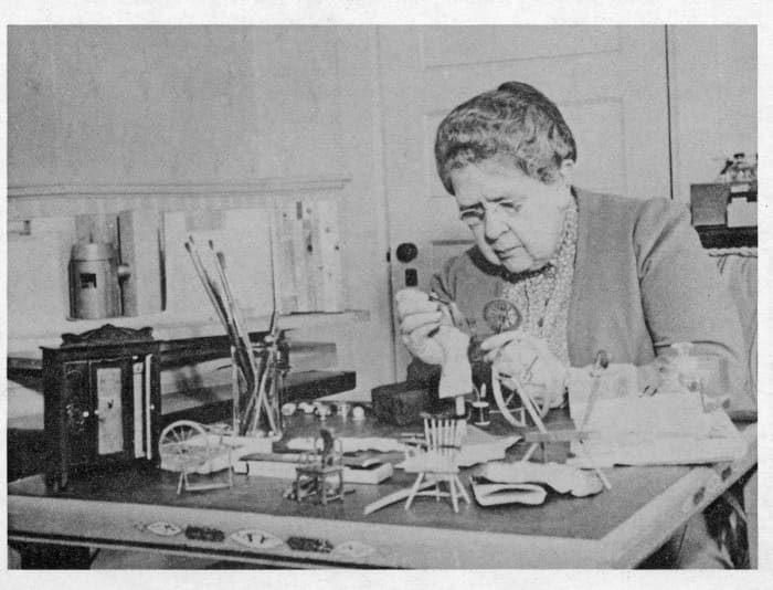 Frances Glessner Lee building a scenario in the Nutshell Collection. Source: Glessner House Museum; Chicago, Illinois. (Public domain as per http://www.nlm.nih.gov/visibleproofs/galleries/biographies/lee.html)