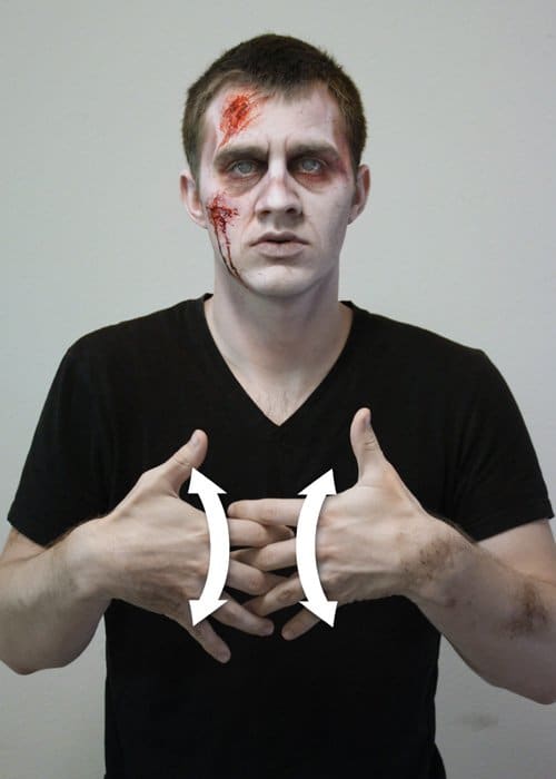 The sign ends with 'machine' which is made with the fingers interlocking and rivet up and down from the wrist.