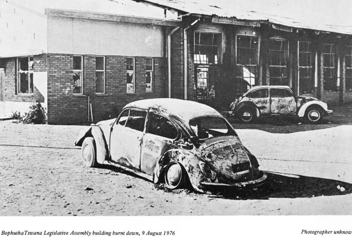 Burned out Volkswagen belonging to the some government administrative official in Bophutatswana Legislature, August 1976