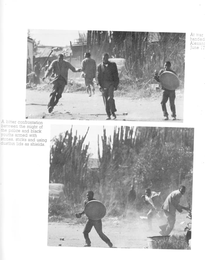Students and locals engage in a nearly bare-handed, stones, sticks and using lids as shield in a battle against the soldiers who were using rifles and llive ammo
