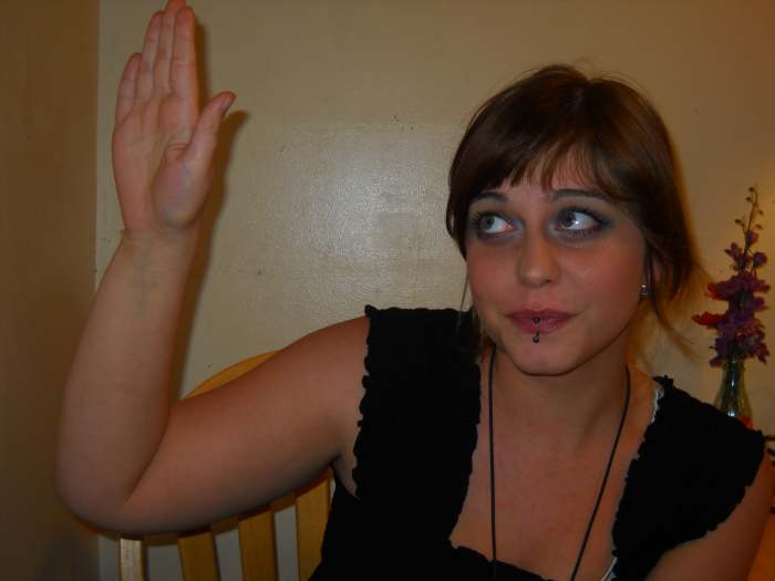 "I don't know": Touch your hand to your temple and then move it away.