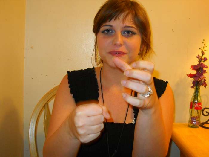 "Milk": Mime milking a cow.