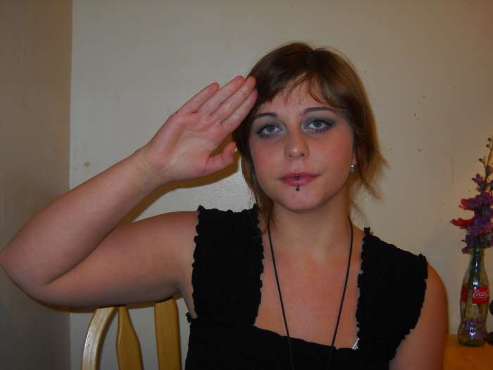 "Hello" part 1: Touch your hand to your temple.