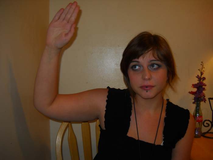 "Hello" part 2: Move your hand outward in a wave.