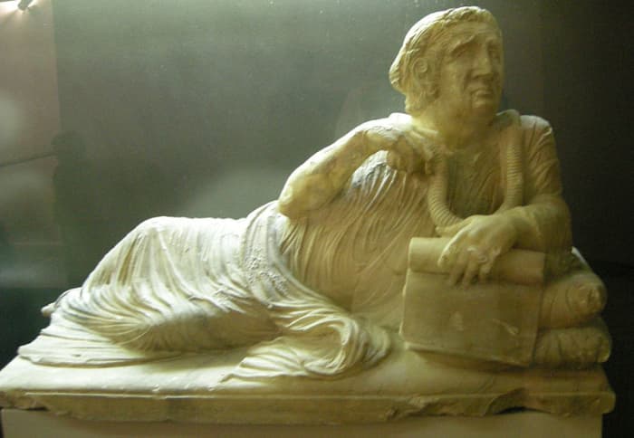 The frightened face of the man on this sarcophagus as he clings to his last worldly possessions marks the beginning of the Etruscans end.