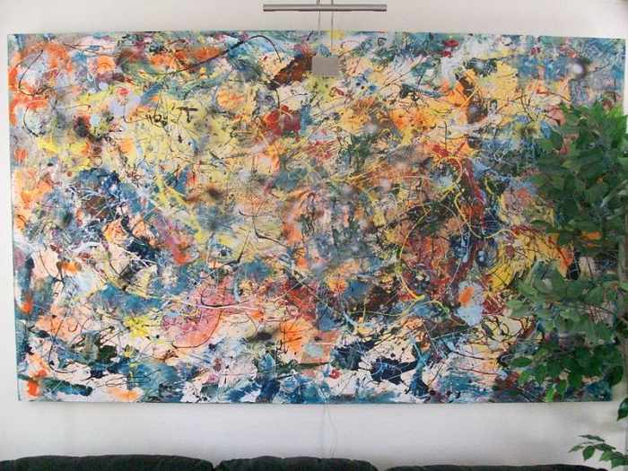A splatter-paint image done in the style of Jackson Pollock.